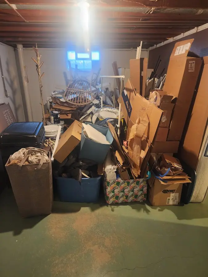 Roll-off dumpster container at job site for Yard Waste Dumpster Rental in Penn Forest